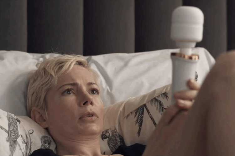 Michelle williams holding a vibrator in the hulu series dying for sex